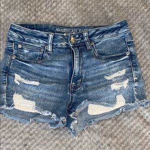 American Eagle medium wash distressed shorts